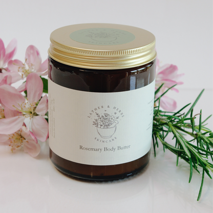 Amber glass jar with gold lid blossom and a rosemary sprig