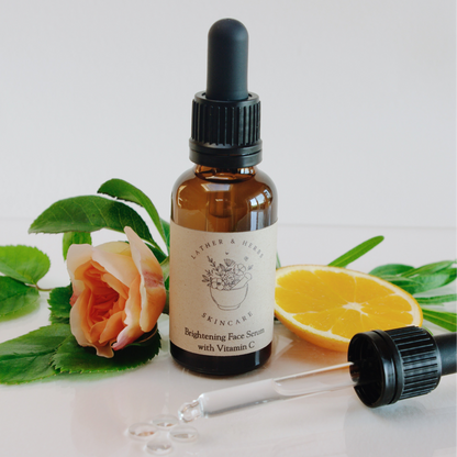 Amber glass bottle with pipette botanicals rose and orange slice